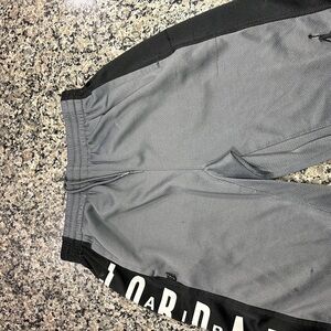Gray and black Jordan shorts sizes Large boys